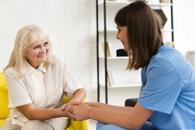 Patient and doctor holding hands